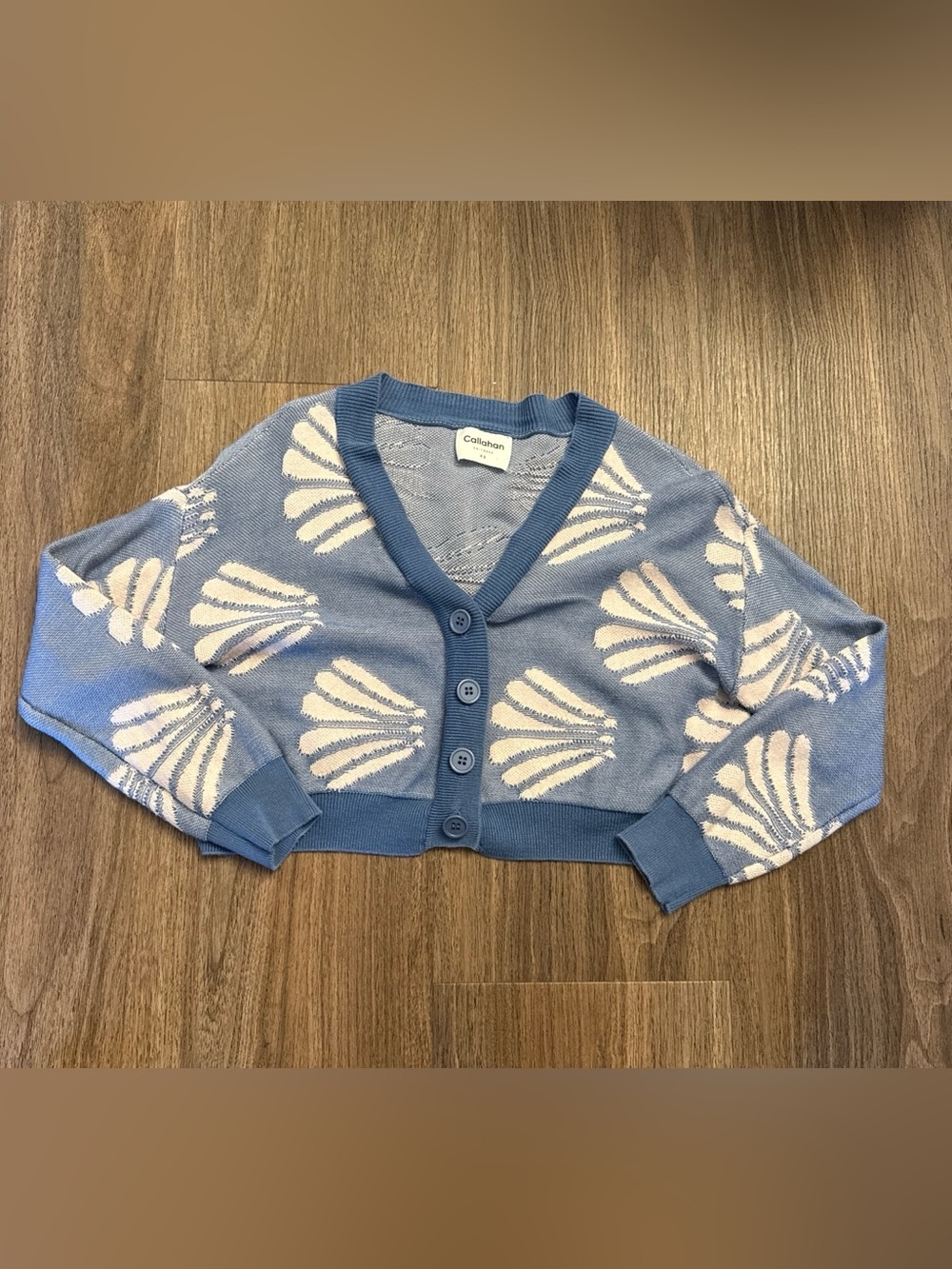 Callahan blue MEG cardigan with white seashells . Size xs
$158 MSRP